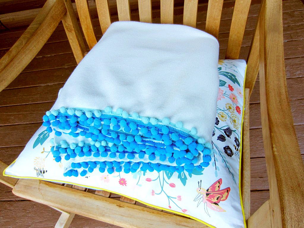 DIY Pom Pom Fleece Blanket - Sewingmachinesplus.com