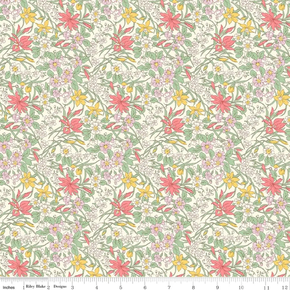 Everlasting Ricardo B quilting cotton fabric with soft pink, yellow, coral, lavender, and green floral motifs on a cream background.