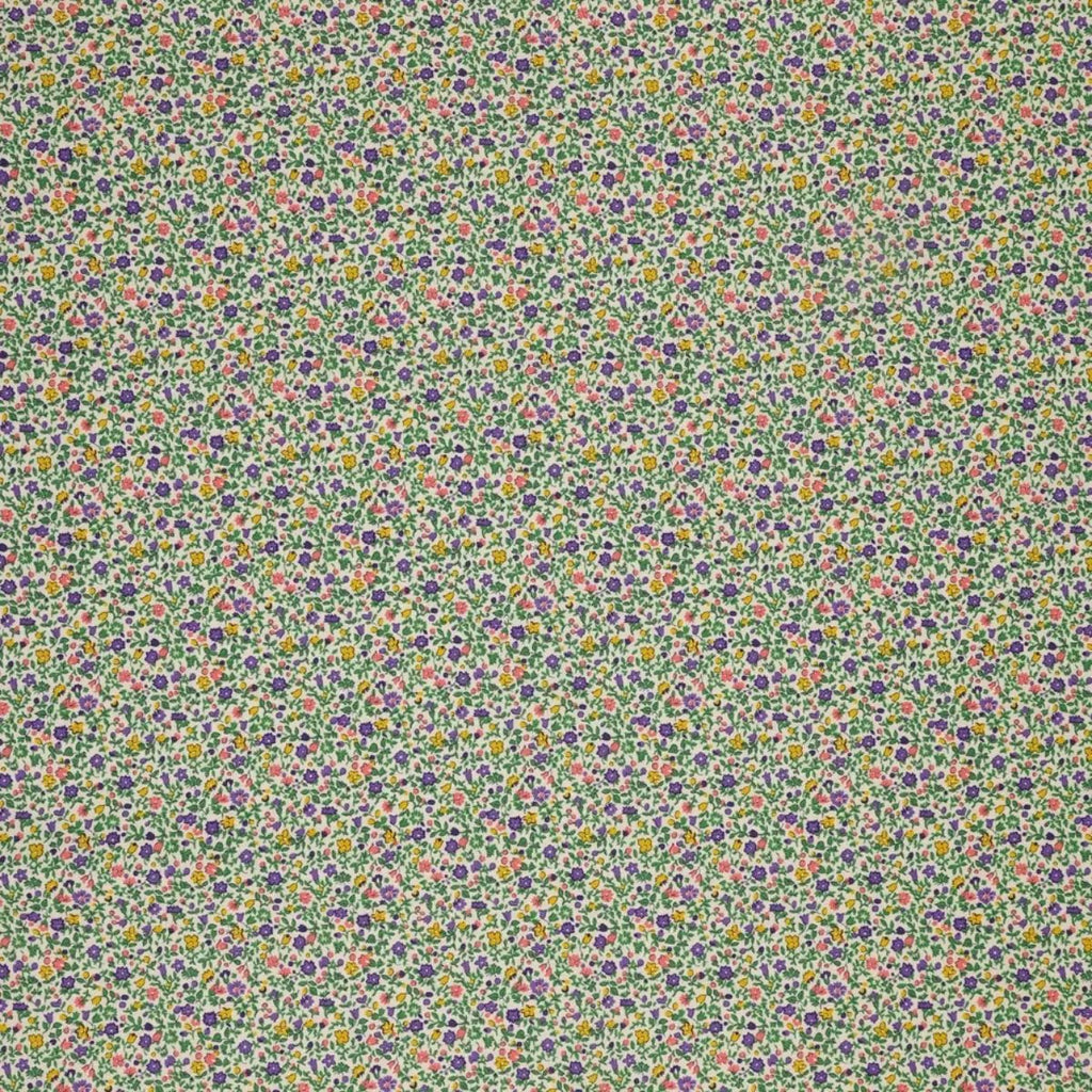 Everlasting Posy Haze A quilting cotton fabric with tiny purple, yellow, pink, and green floral motifs on a light background.