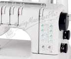 Janome 1000CPX Cover Pro coverstitch machine in white with front stitch-guide diagram and control dials