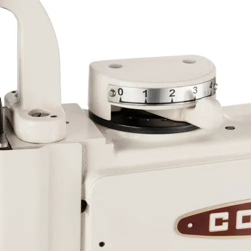 Consew 104-10T sewing machine, industrial cream finish with visible dial and logo badge.