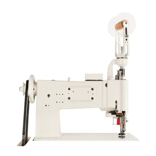 Consew 104-10T single-needle industrial sewing machine on sturdy white stand with wheel, universal feed movement