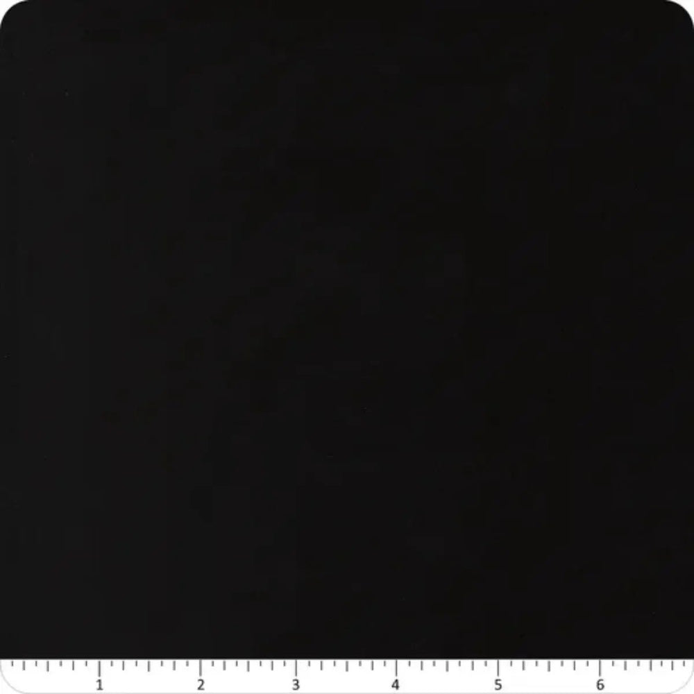 Flannel Gatherings Basics Blackbird cotton flannel fabric with a deep black-charcoal mottled tonal texture.