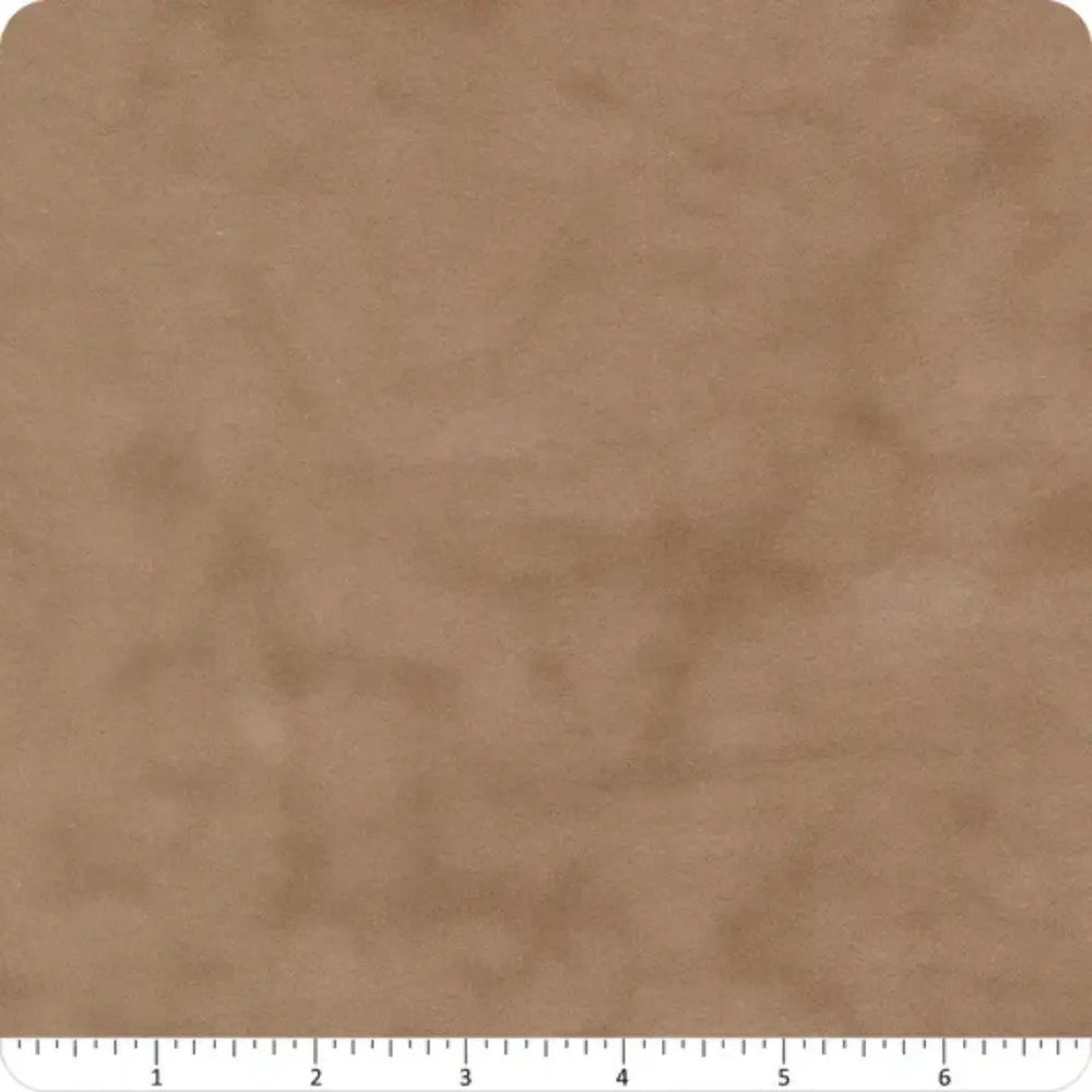 Flannel Gatherings Basics Taupe Muslin cotton flannel fabric with a soft mottled light brown and taupe texture.