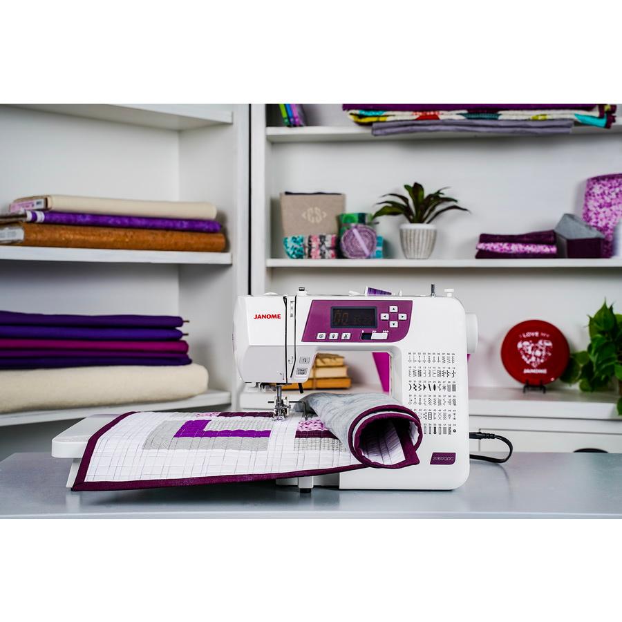 Janome 3160QDC Computer Sewing Machine (Purple/Grape Color) - Sewingmachinesplus.com