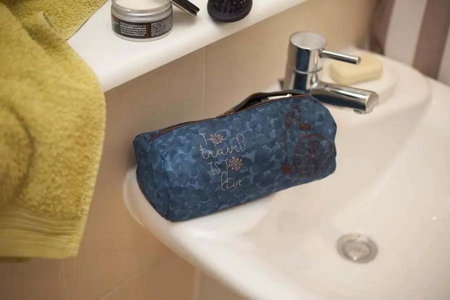 Threaders Embroidery Transfer Sheets Traveller pouch in blue patterned fabric with zipper