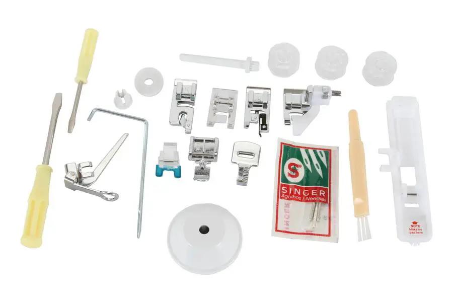 Singer sewing machine accessory kit with metal presser feet, screwdrivers, and small plastic parts