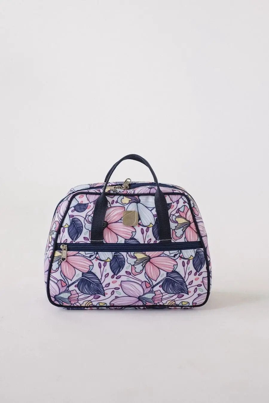 Bluefig Quilter Essential project bag in a pink floral print with dark navy handles