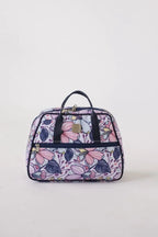 Bluefig Quilter Essential project bag in a pink floral print with dark navy handles