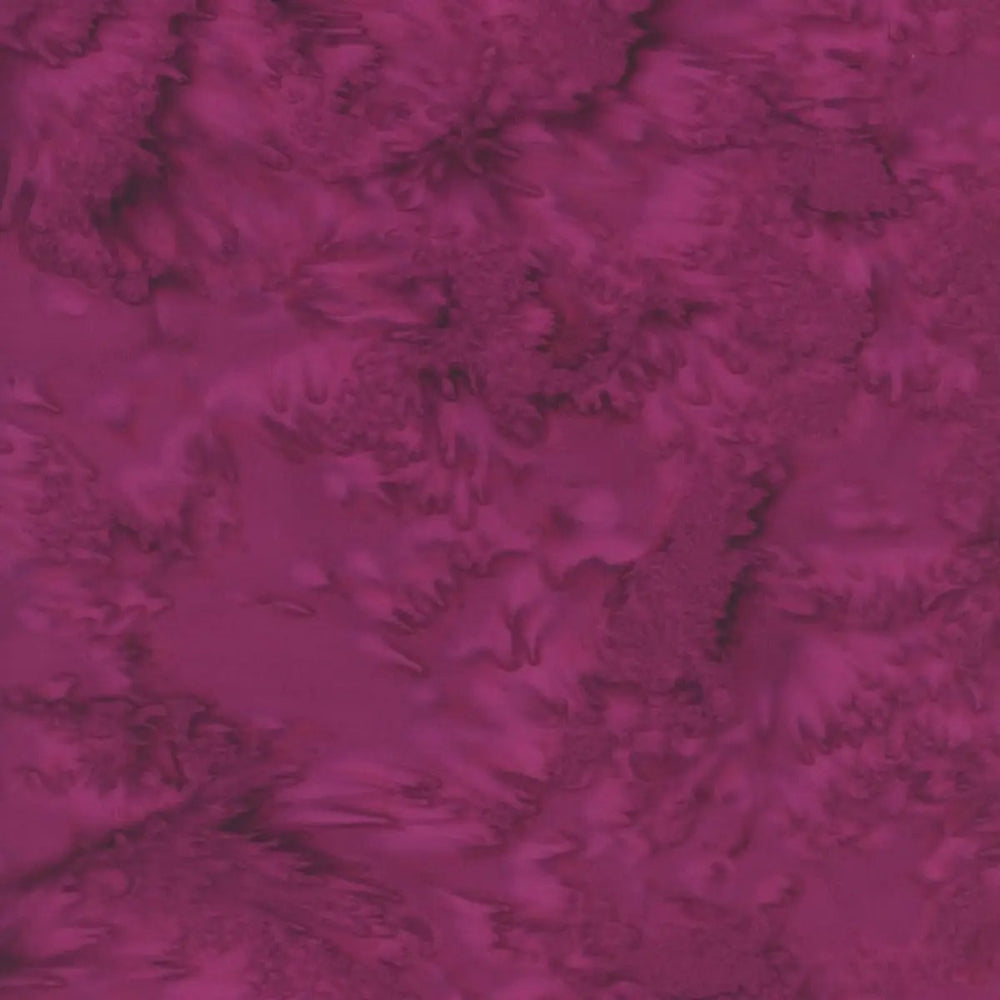 Bali Watercolors Cabernet hand-dyed cotton batik fabric with rich wine, magenta, burgundy, and plum tonal watercolor texture.