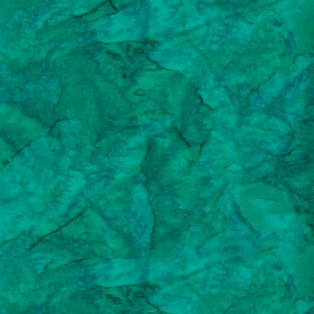 Bali Watercolors Stone Green batik quilting cotton with mottled green tonal texture by Hoffman Fabrics.
