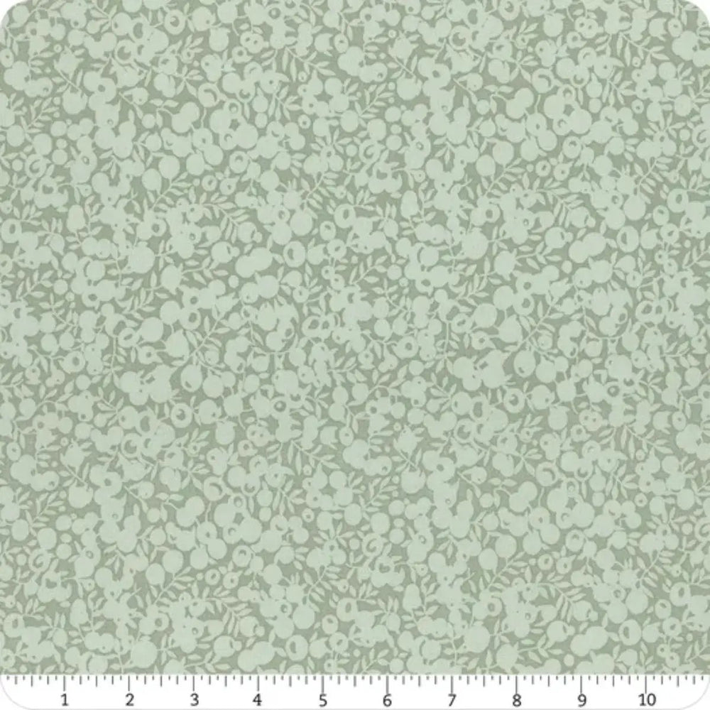 Liberty Fabrics Wiltshire Shadow Sage quilting cotton with small berry and leaf motifs in soft sage green tones.