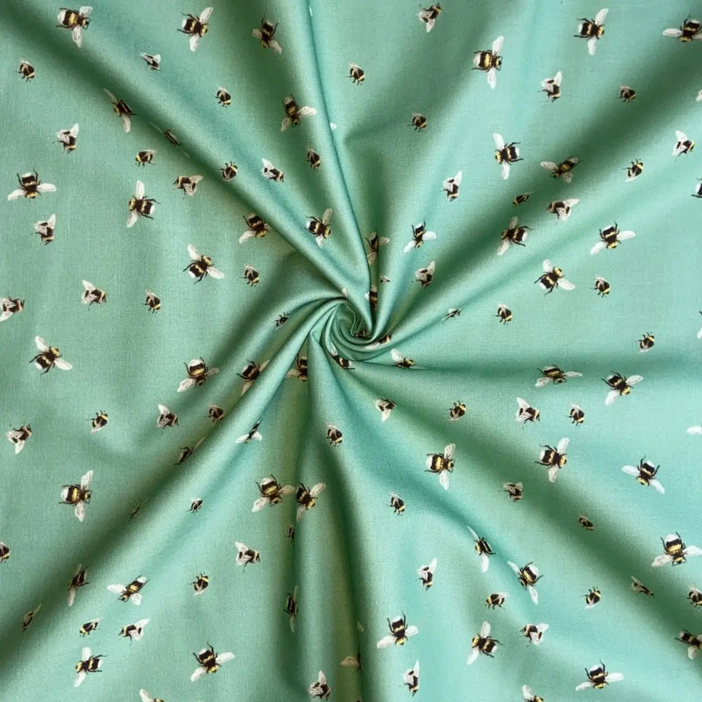 Bee World Seafoam quilting fabric with scattered bee motifs by Sarah J Patterson for Sewing Sanctuary