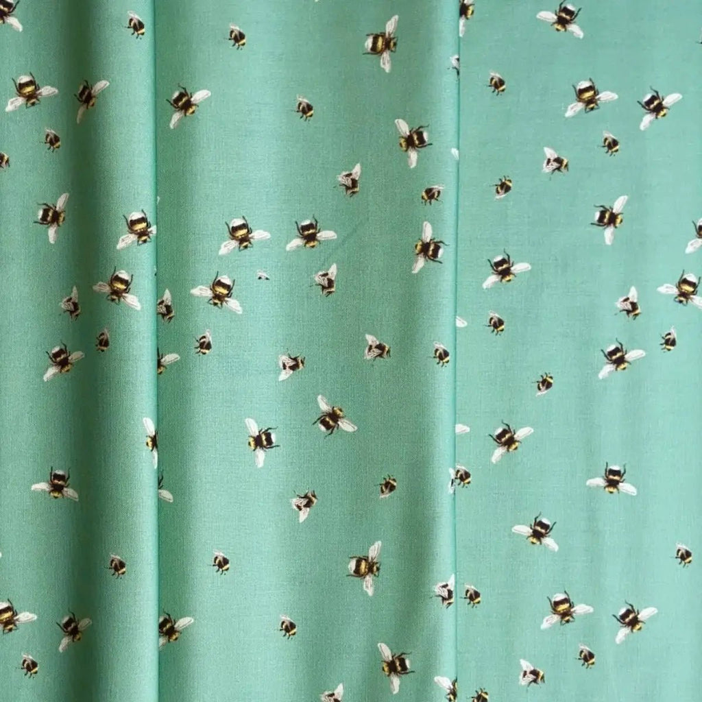 Bee World Seafoam quilting fabric with scattered bee motifs by Sarah J Patterson for Sewing Sanctuary