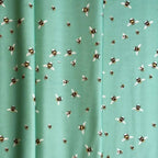 Bee World Seafoam quilting fabric with scattered bee motifs by Sarah J Patterson for Sewing Sanctuary