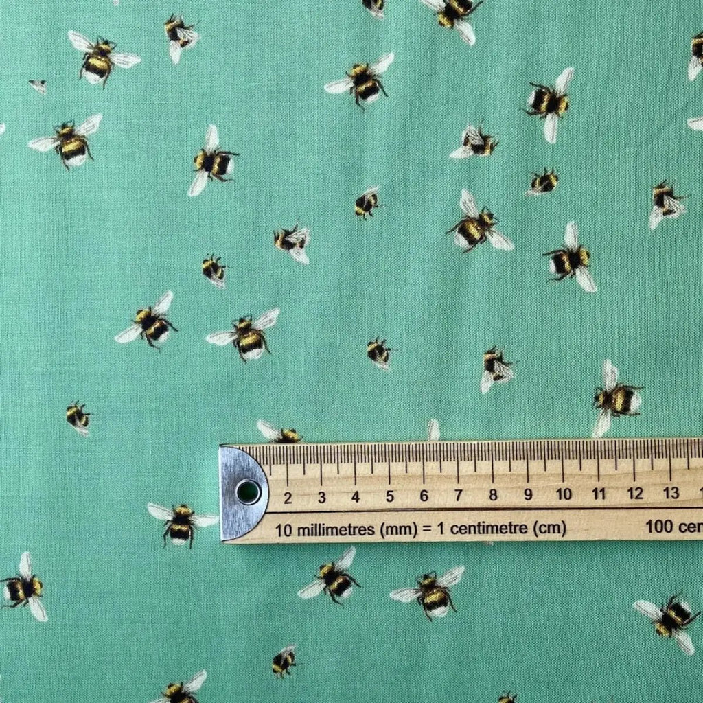 Bee World Seafoam quilting fabric with scattered bee motifs by Sarah J Patterson for Sewing Sanctuary
