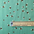 Bee World Seafoam quilting fabric with scattered bee motifs by Sarah J Patterson for Sewing Sanctuary