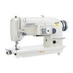 Consew 199R industrial sewing machine with table and motor, cream color, single-needle drop-feed.