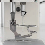 Consew 199RB industrial sewing machine with table and motor; single-needle drop-feed.