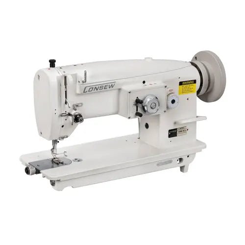 Consew 199RB single-needle drop-feed industrial sewing machine with table and motor, white.