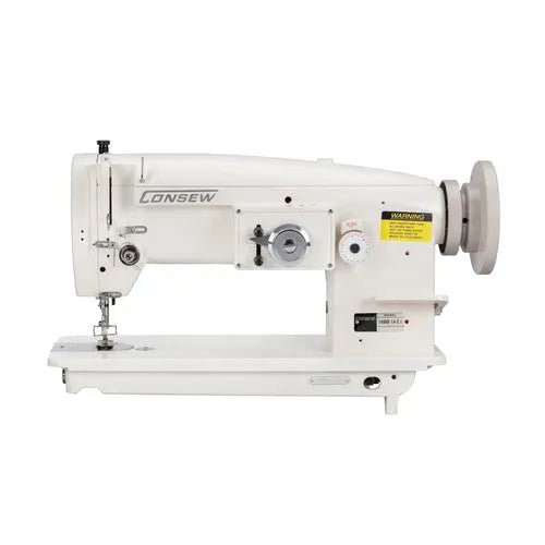 Consew 199RB industrial sewing machine with table and motor; white, single-needle, drop-feed operation.