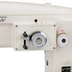 Consew 199RB single-needle industrial sewing machine head, white with table and motor.