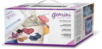 Gemini Junior cutting and embossing machine in its packaging by Gemini, Crafter's Companion, purple accents