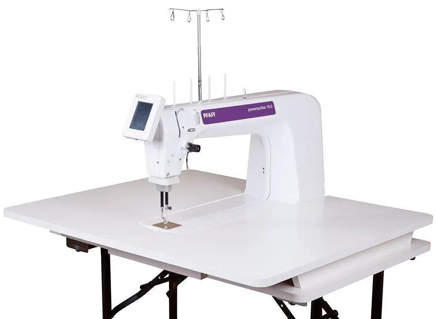 Pfaff PowerQuilter 16.0 long-arm quilting machine in white with purple branding on a quilting table