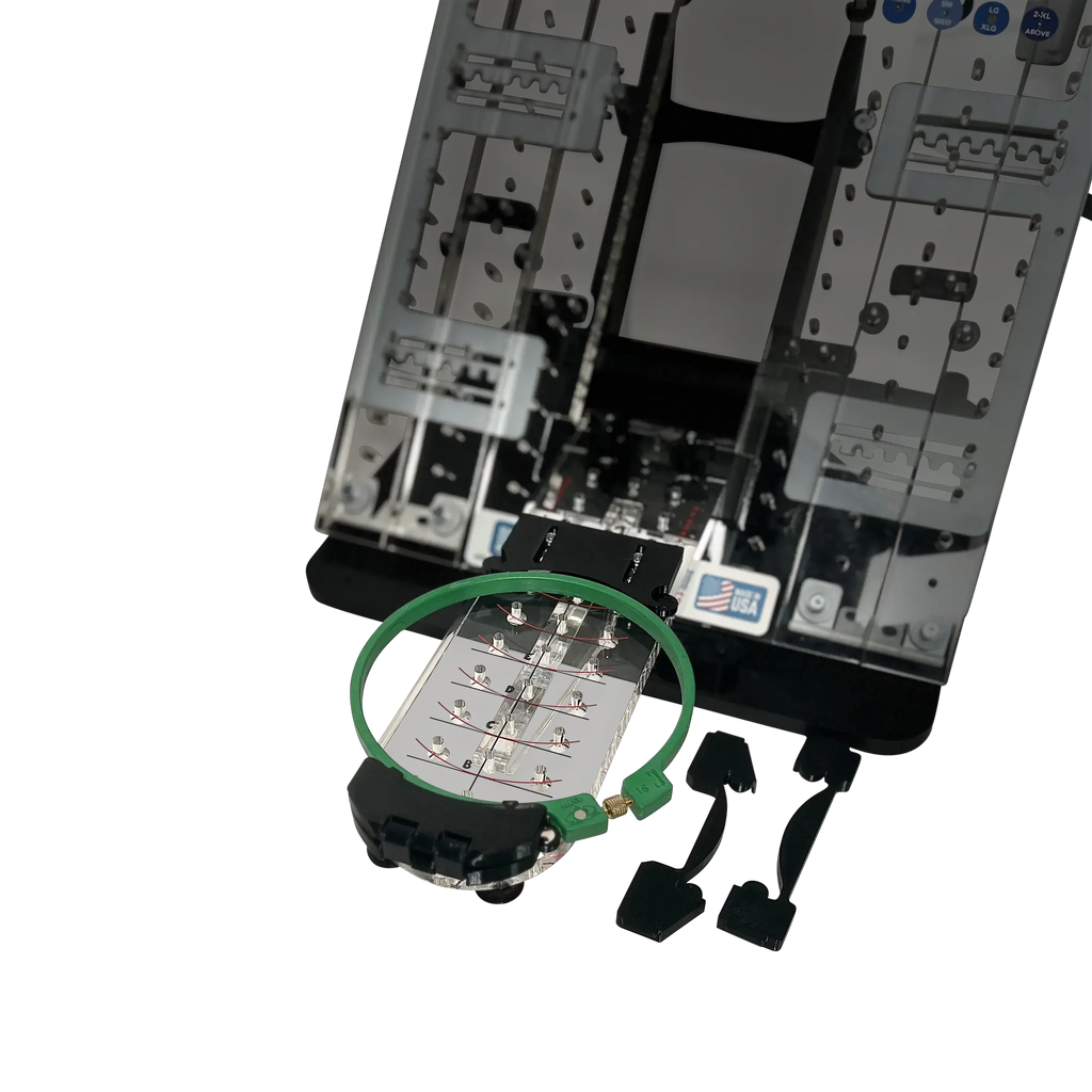 Sleeve / Cap Board Pro Combo Bracket Set Add-On by Tex Inc; hooping aid for embroidery machines with a green hoop.