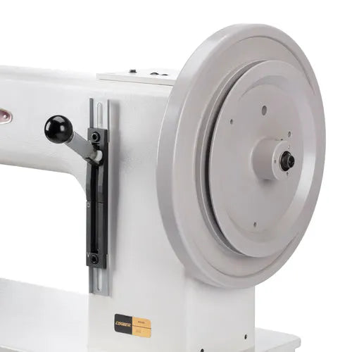 Consew 2040 single-needle heavy-duty industrial sewing machine with large gray flywheel and table
