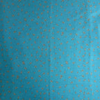 The Magical Garden Little Rose Ocean Blue quilting fabric with red and cream rosebuds and green leaves by Sarah J Patterson
