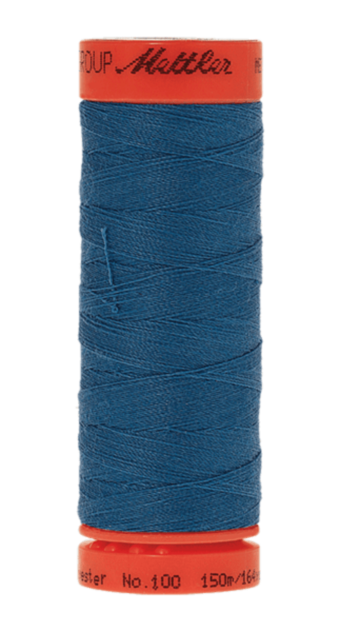 Mettler Metrosene Plus polyester thread spool in Tropical Blue, 164 yards.