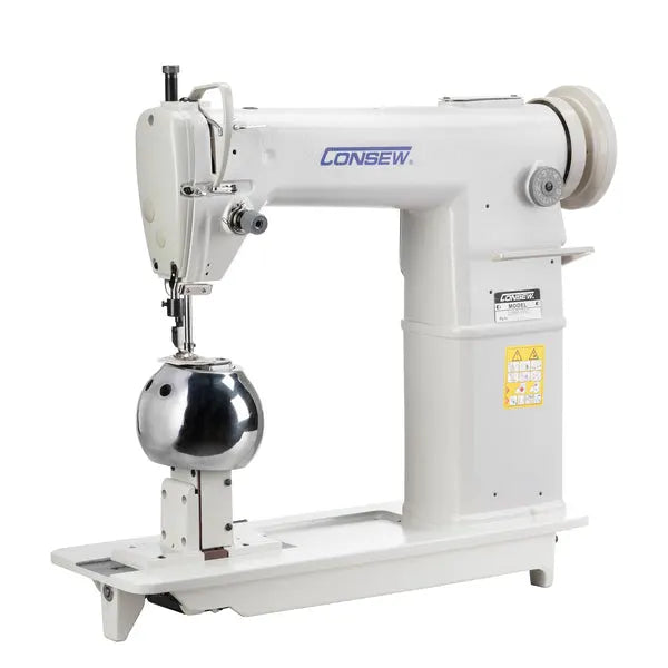 Consew 228R-WIG industrial sewing machine post type, white, spherical needle area.