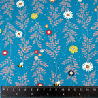 Oh Blooming Dale Turquoise quilting fabric with colorful daisy floral motifs by Sarah J Patterson for Sewing Sanctuary