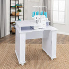Koala Serger Studio white sewing machine extension table with casters and thread spools.