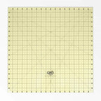 Quilters Select 18x18 inch non-slip quilting ruler with beige grid and Quilters Select logo