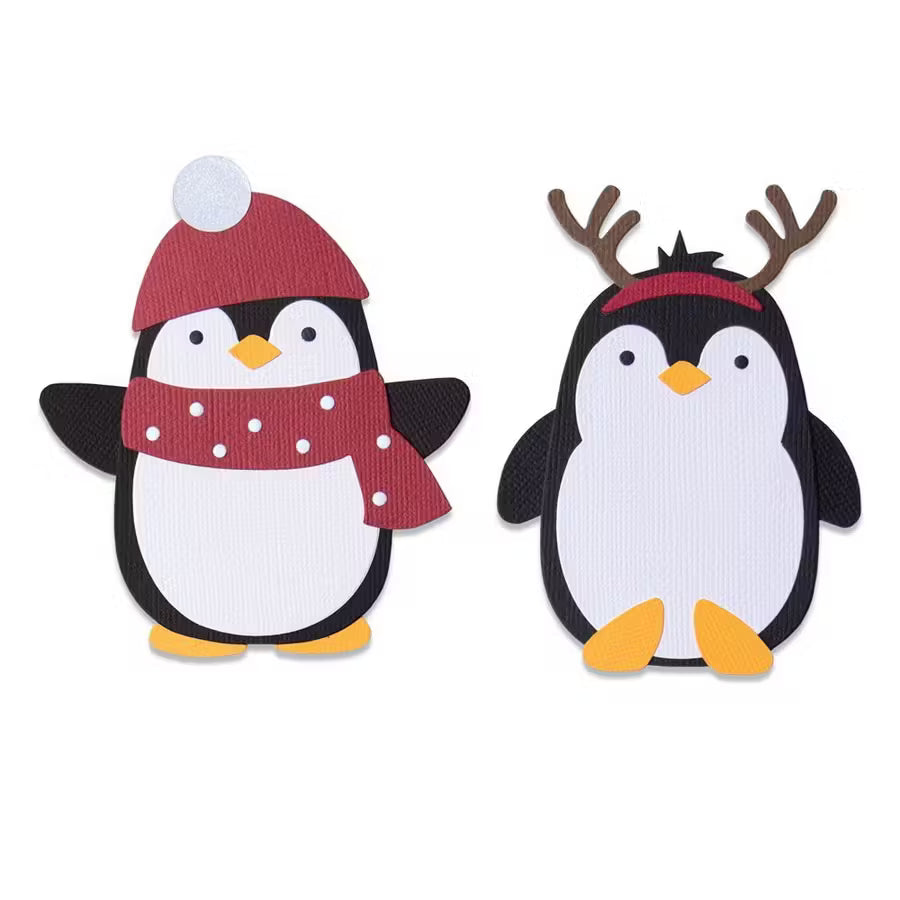 Sizzix Bigz Die Penguin Friends cutouts; two penguins in winter outfits with red scarf and hat on left, antlers on right