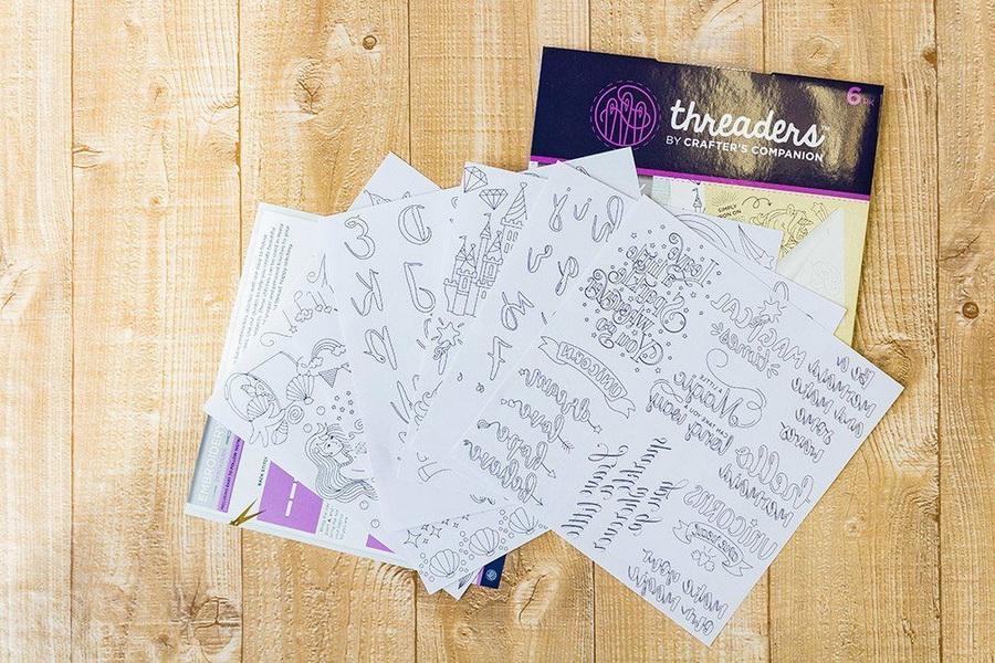 Threaders Embroidery Transfer Sheets - Fantasy set; 6 white sheets with whimsical script designs, Threaders.