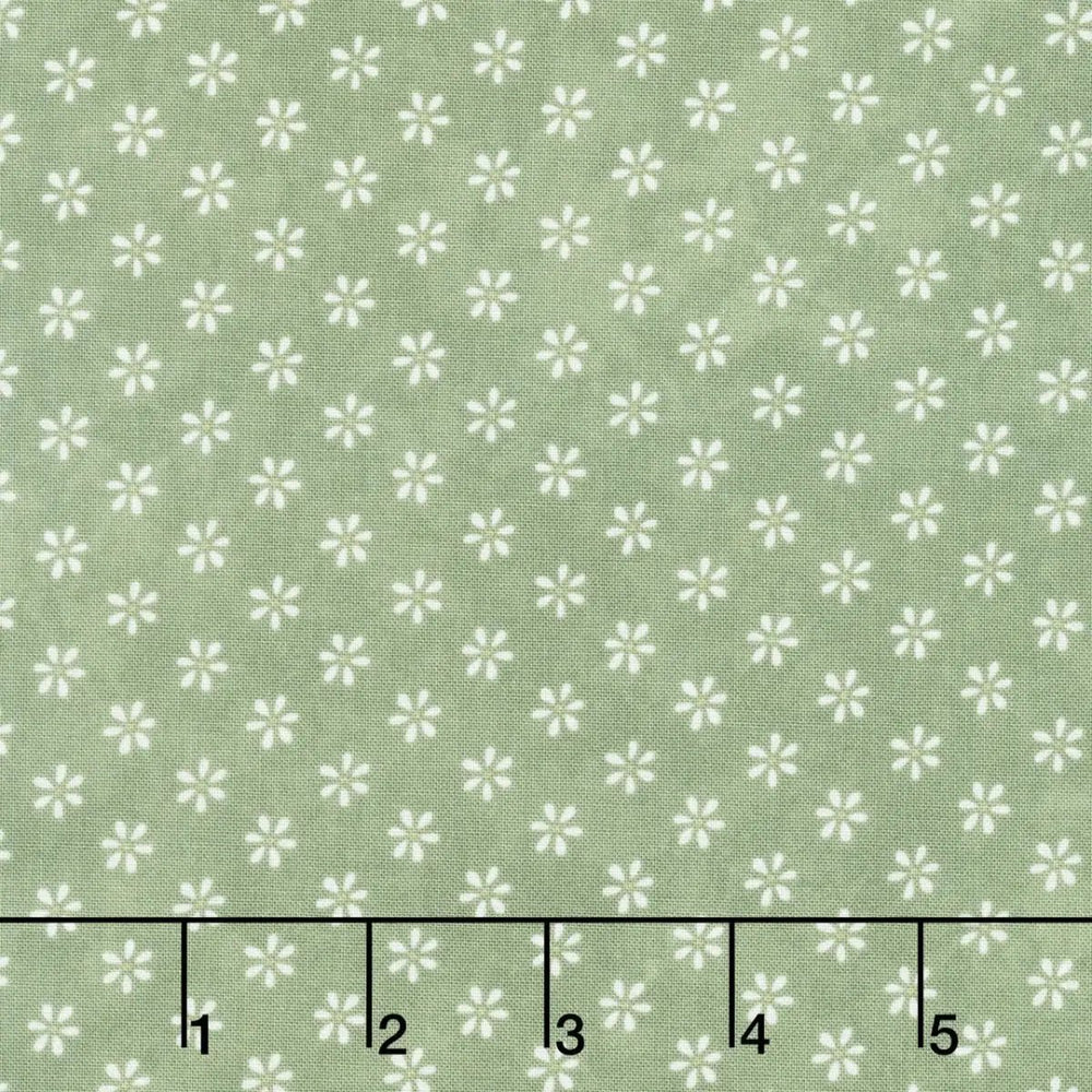 Friendship Garden Green Little Flowers quilting cotton fabric with small white floral motifs on a green background.