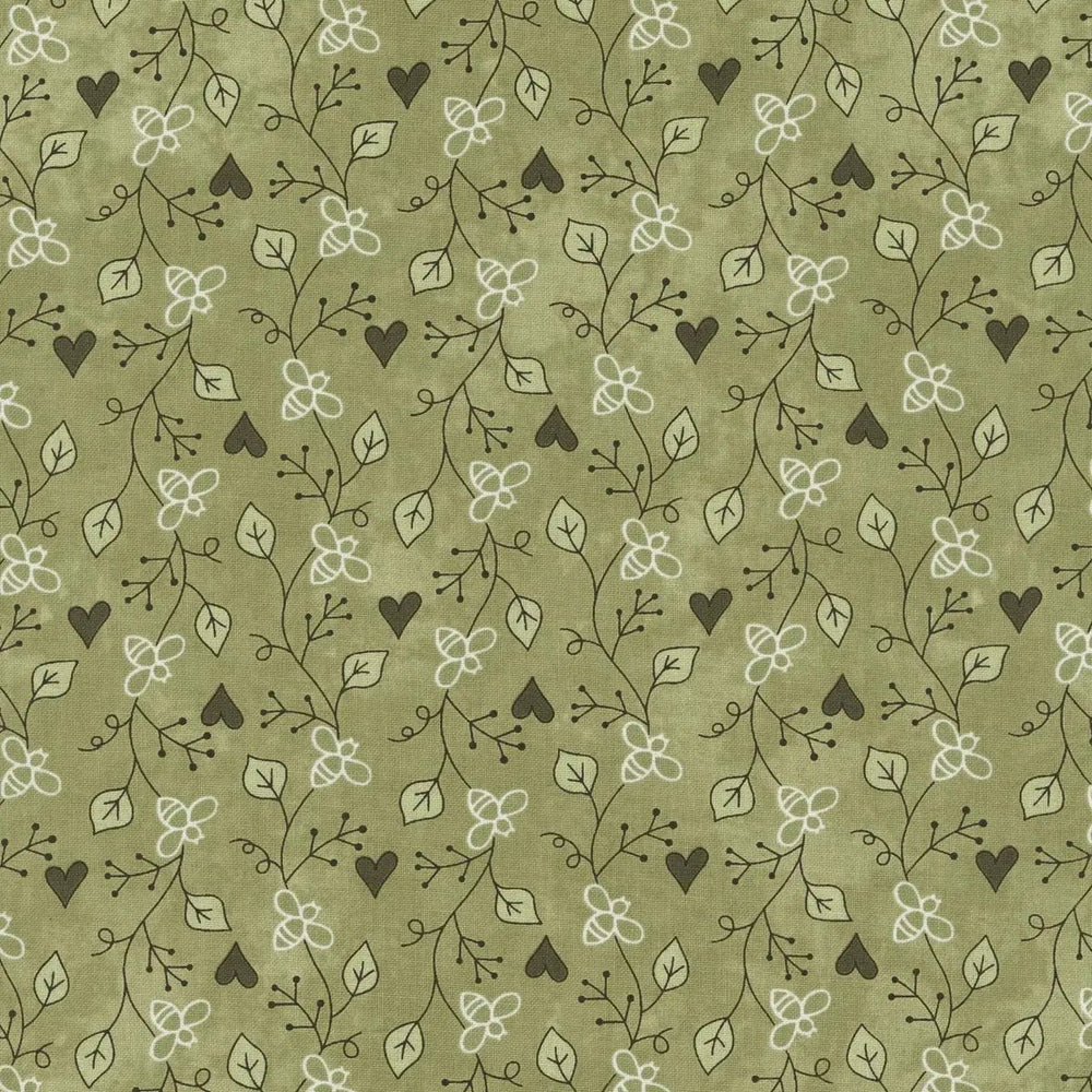 Friendship Garden Light Green Friendship Vine quilting cotton fabric with delicate vine motifs on a soft green background.