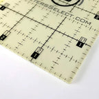 Quilters Select 12 by 12 cream non-slip ruler with grid markings