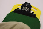 DIME Magnetic Hoop Clip with yellow base and black metal clip securing a green hoop