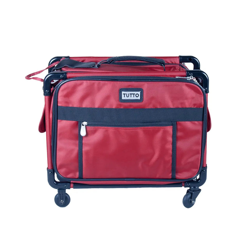 Tutto 17-inch red carry-on luggage on wheels with navy accents and front zip pocket.