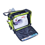 Tutto 17in small lime carry-on luggage on wheels opened to reveal sewing machine inside
