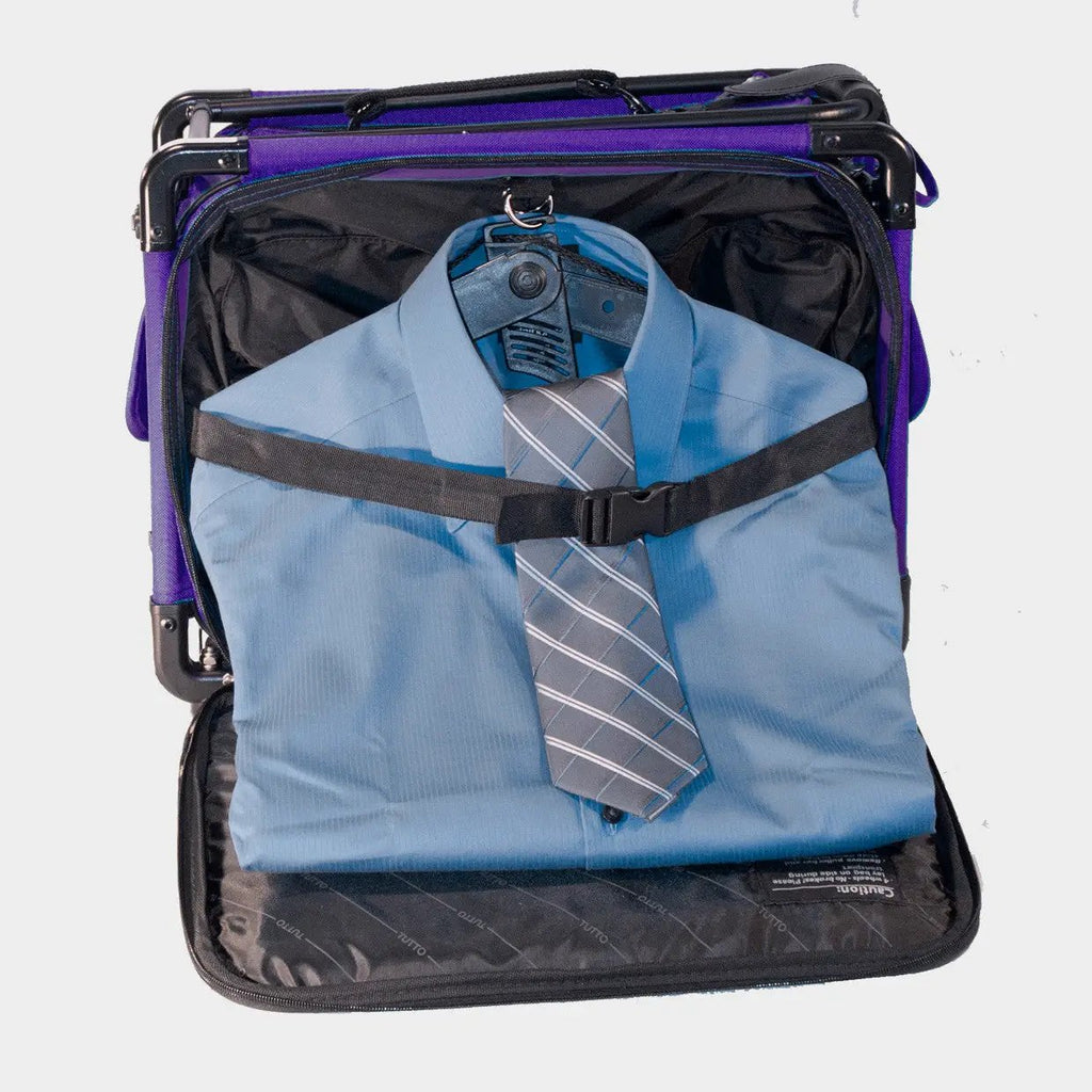 Tutto 17-inch purple carry-on luggage on wheels, open with a blue dress shirt and striped tie inside