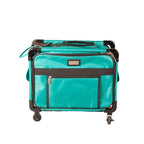 17-inch Tutto turquoise small carry-on luggage on wheels with front zip pocket, black trim, and logo badge