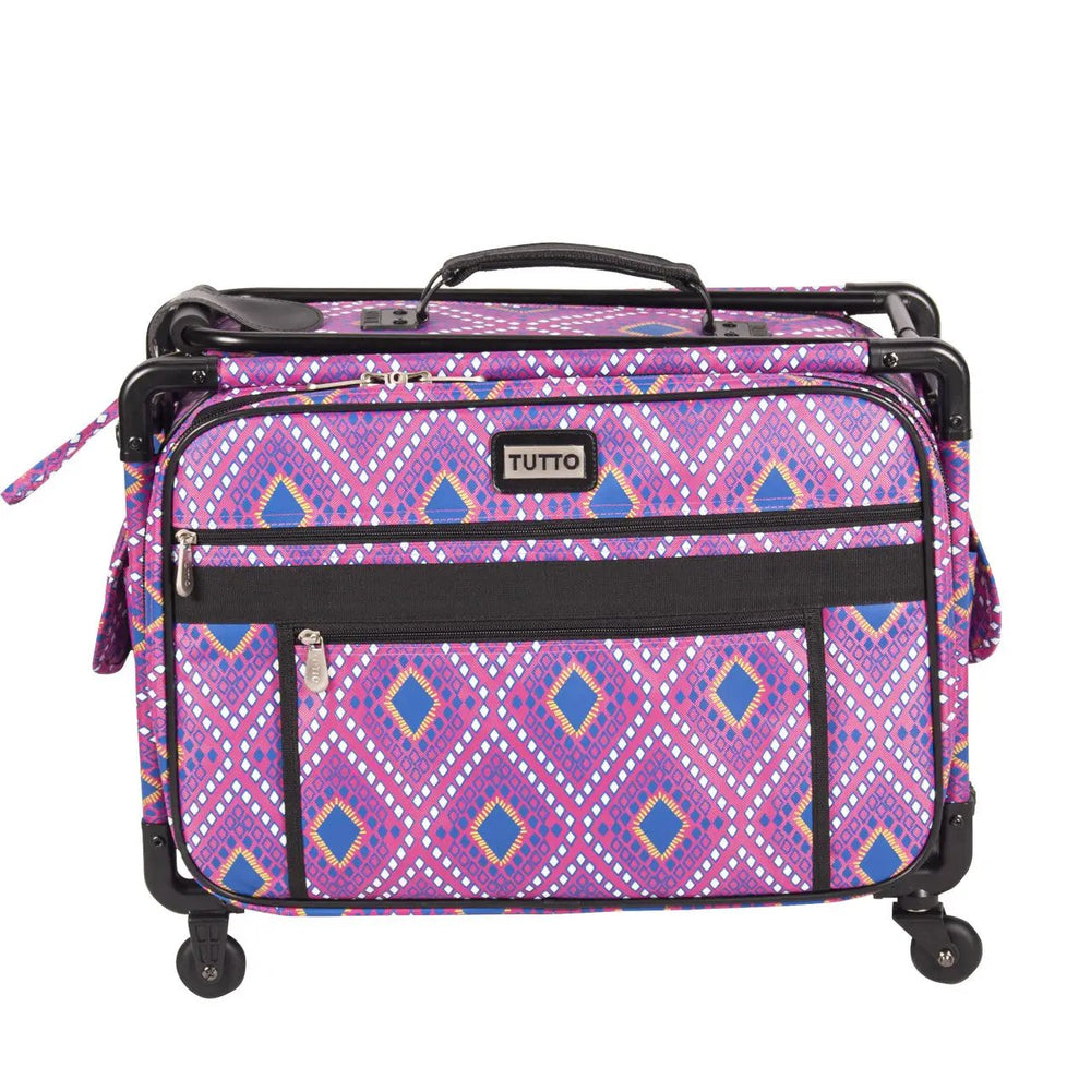 20-inch pink Tutto diamond-print machine bag on wheels with front zip pockets and black trim