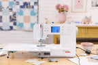 Bernette B57 sewing machine, white with touchscreen display; bernette logo visible