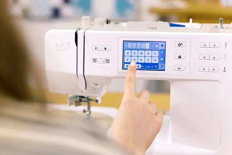 Bernette B57 sewing machine with touchscreen, white finish.