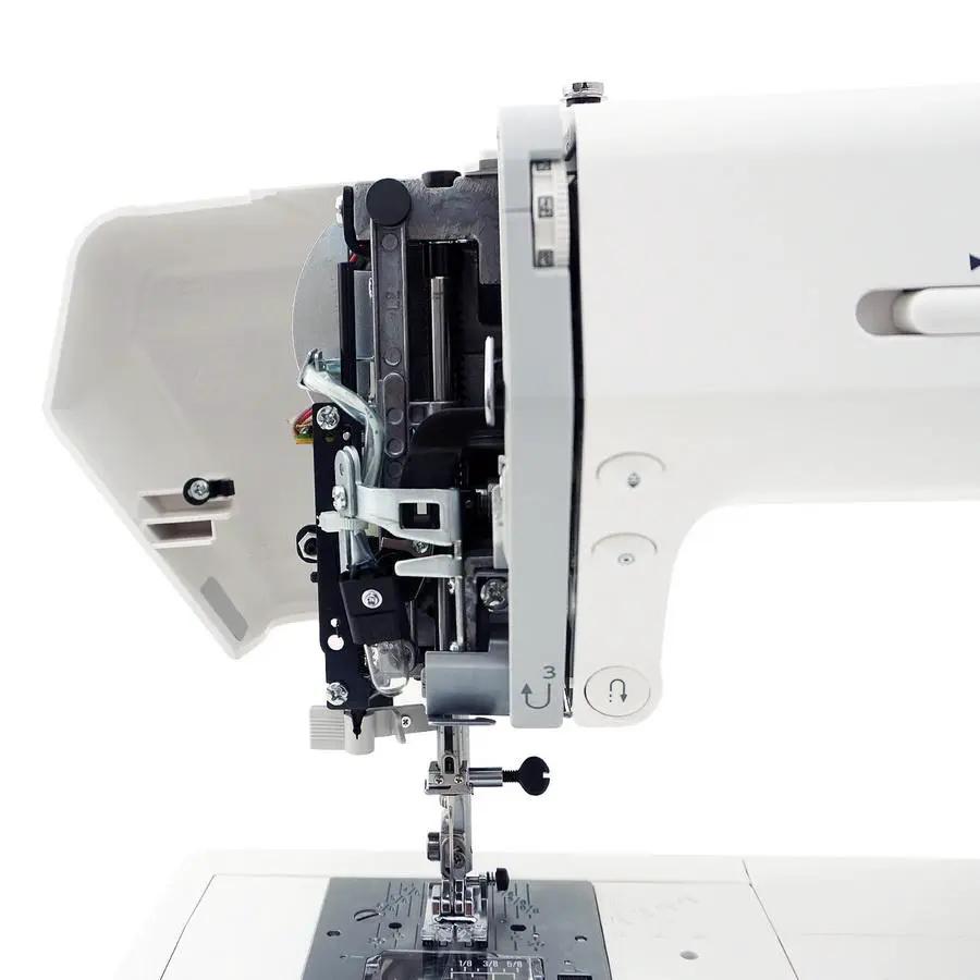 Janome DC2019 computerized sewing machine with exposed internal mechanism